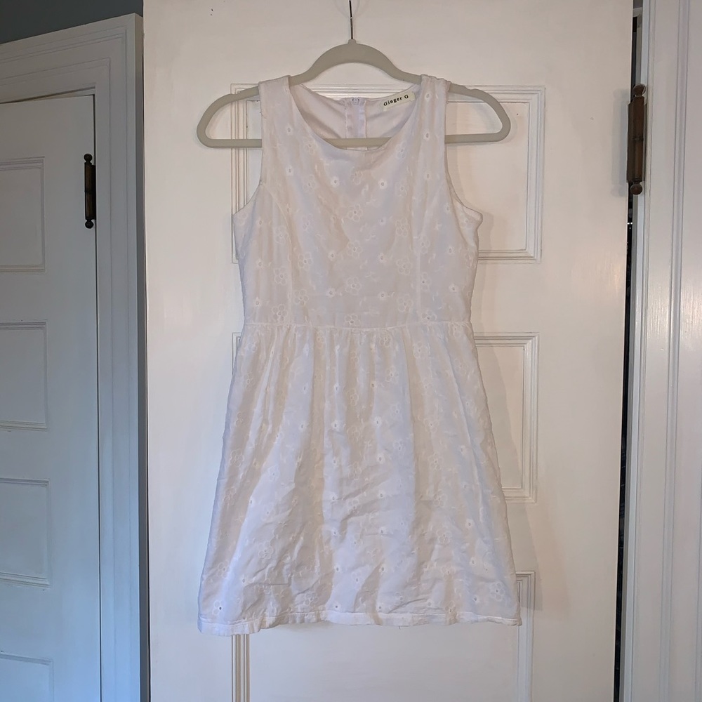 white dress with elegant flower embroidery